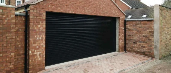 Black roller garage door installation